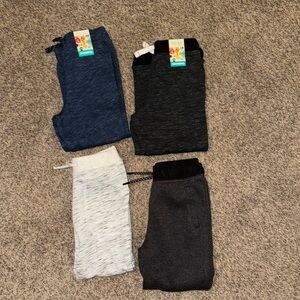 Four pairs of size 5T toddler boy Garanimals sweatpants